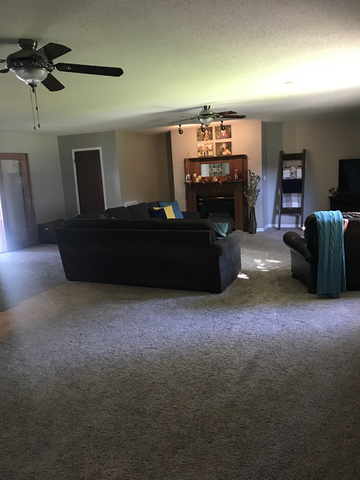 307 Prairie Street Spring Valley, IL 61362 - Photo 5 of 21 a living room with furniture and a flat screen tv