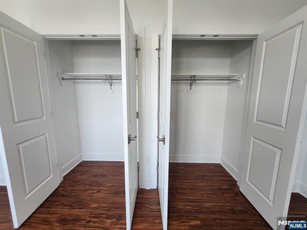 77 Ridge, Unit 306 North Arlington, NJ 07031 - Photo 15 of 23 a view of a hallway with wooden floor