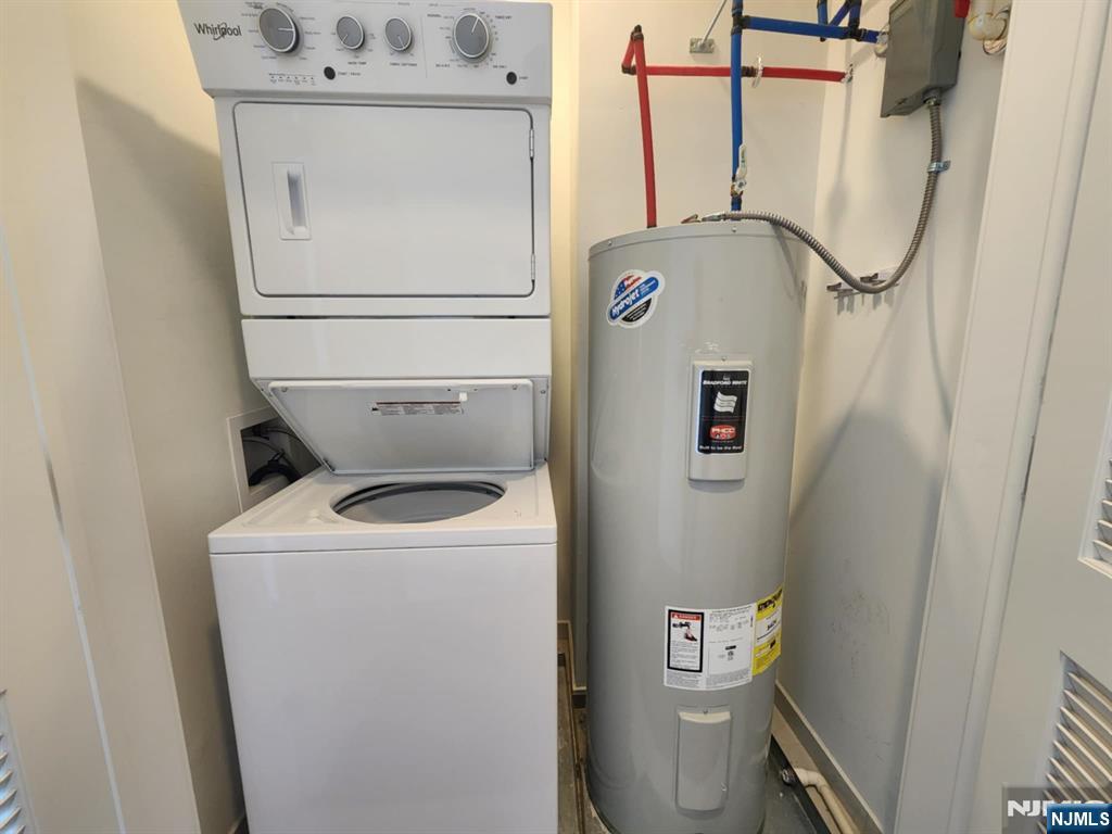 77 Ridge, Unit 306 North Arlington, NJ 07031 - Photo 18 of 23 a utility room with dryer and washer