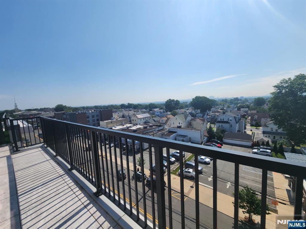 77 Ridge, Unit 306 North Arlington, NJ 07031 - Photo 19 of 23 a view of city and deck