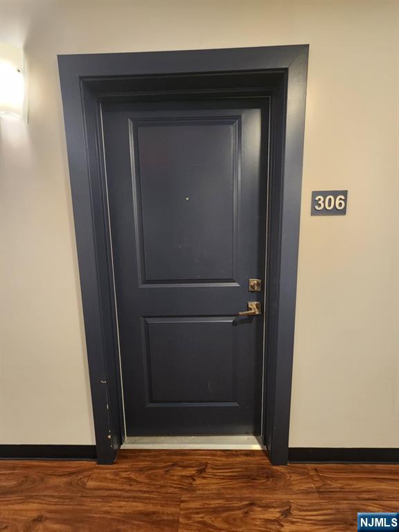 77 Ridge, Unit 306 North Arlington, NJ 07031 - Photo 3 of 23 a view of a wooden door