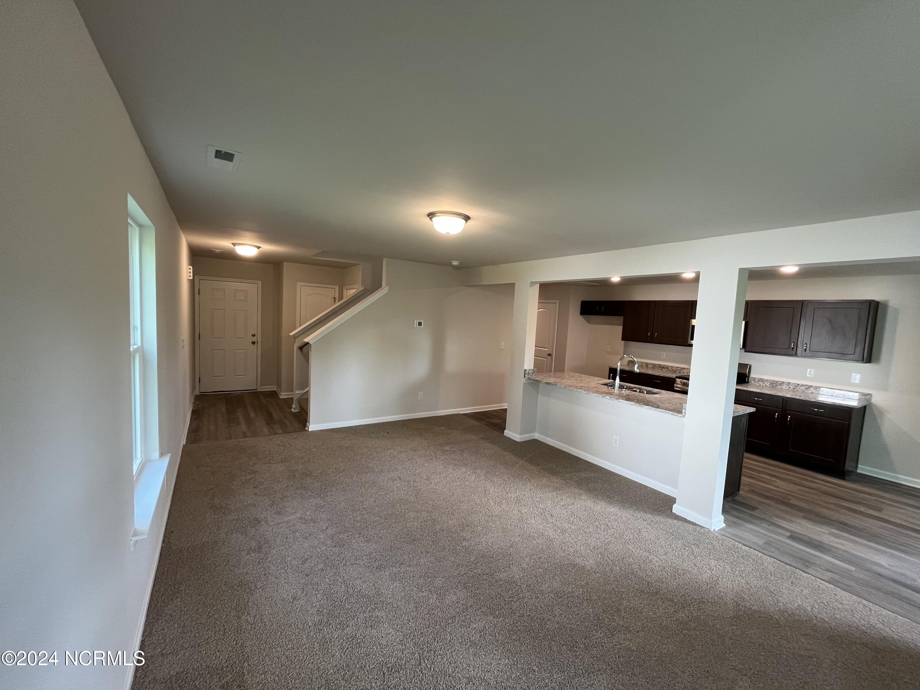 147 Slatestone Road Washington, NC 27889 - Photo 4 of 23 Family room from back wall