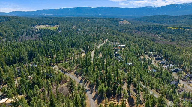 a view of lake with green space