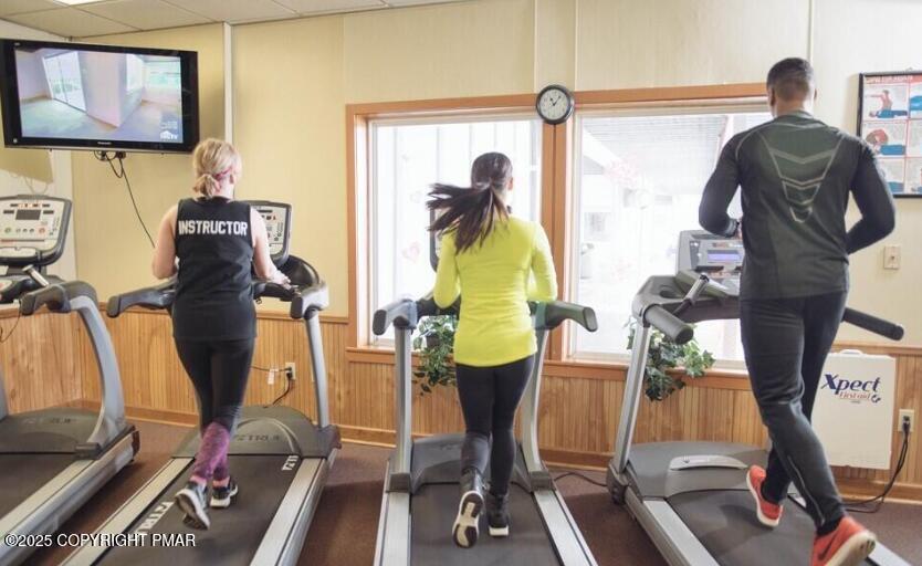 2108 Scarborough Way Bushkill, PA 18324 - Photo 99 of 105 a view of gym equipment with a view of living room