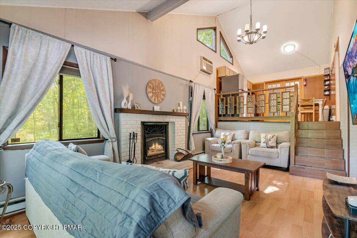 2108 Scarborough Way Bushkill, PA 18324 - Photo 11 of 105 a living room with furniture and a fireplace