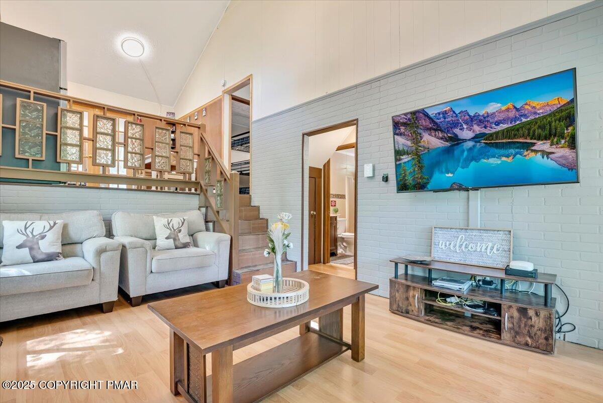 2108 Scarborough Way Bushkill, PA 18324 - Photo 19 of 105 a living room with furniture and a painting on the wall