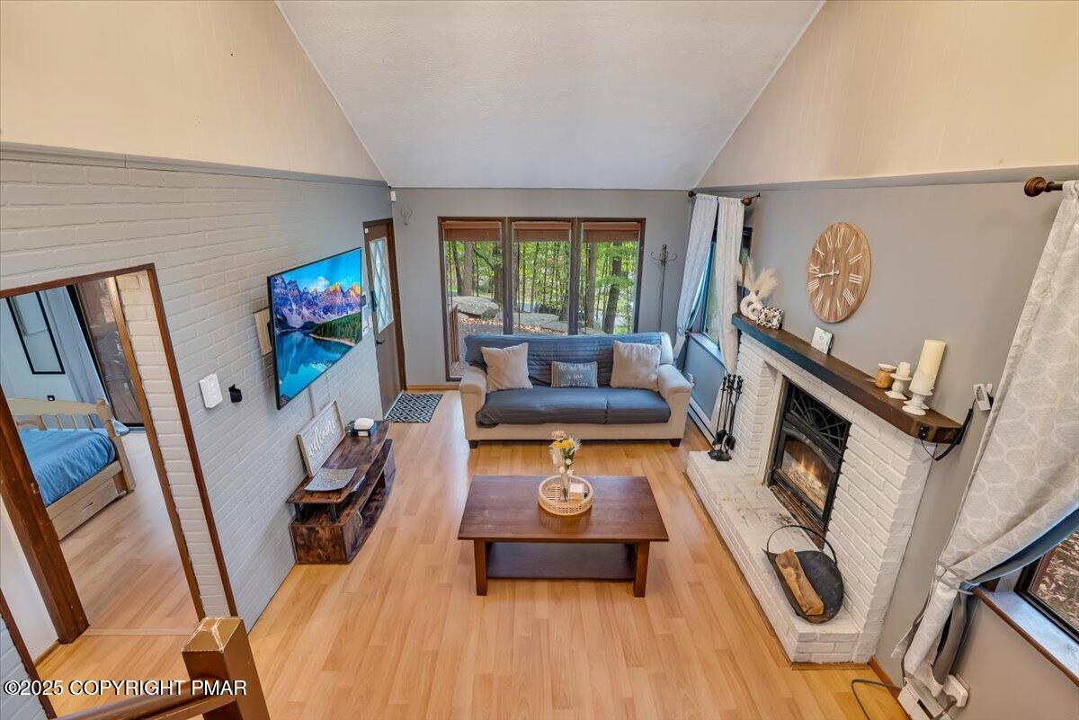 2108 Scarborough Way Bushkill, PA 18324 - Photo 21 of 105 a living room with furniture and a flat screen tv
