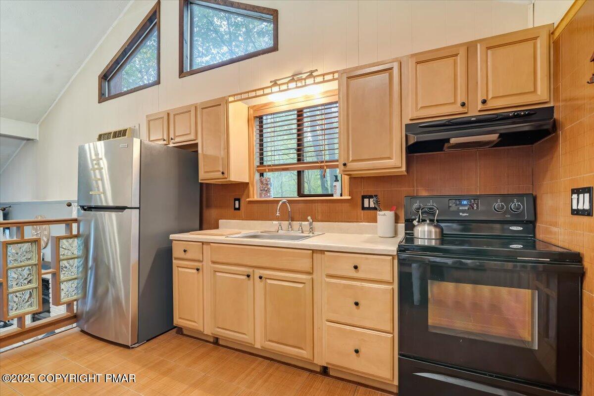 2108 Scarborough Way Bushkill, PA 18324 - Photo 24 of 105 a kitchen with stainless steel appliances granite countertop a refrigerator and a stove top oven