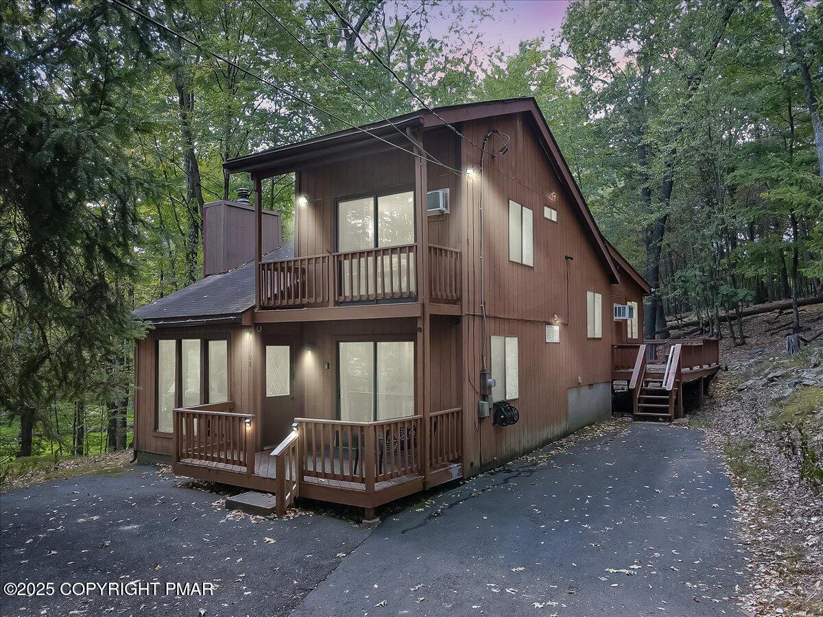 2108 Scarborough Way Bushkill, PA 18324 - Photo 3 of 105 a front view of a house with a yard