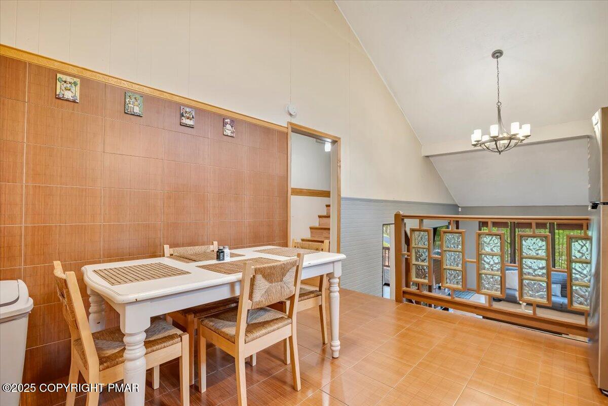 2108 Scarborough Way Bushkill, PA 18324 - Photo 28 of 105 a view of a dining room with furniture window and outside view