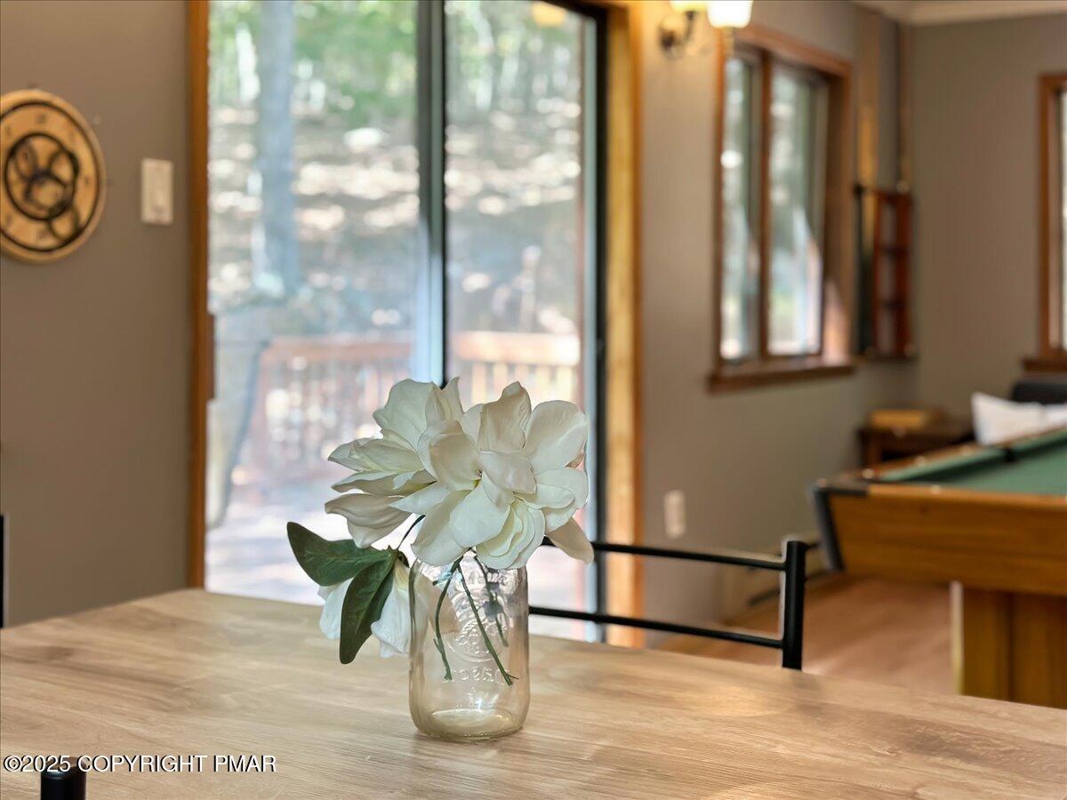 2108 Scarborough Way Bushkill, PA 18324 - Photo 36 of 105 a view of a dining room with furniture and a window
