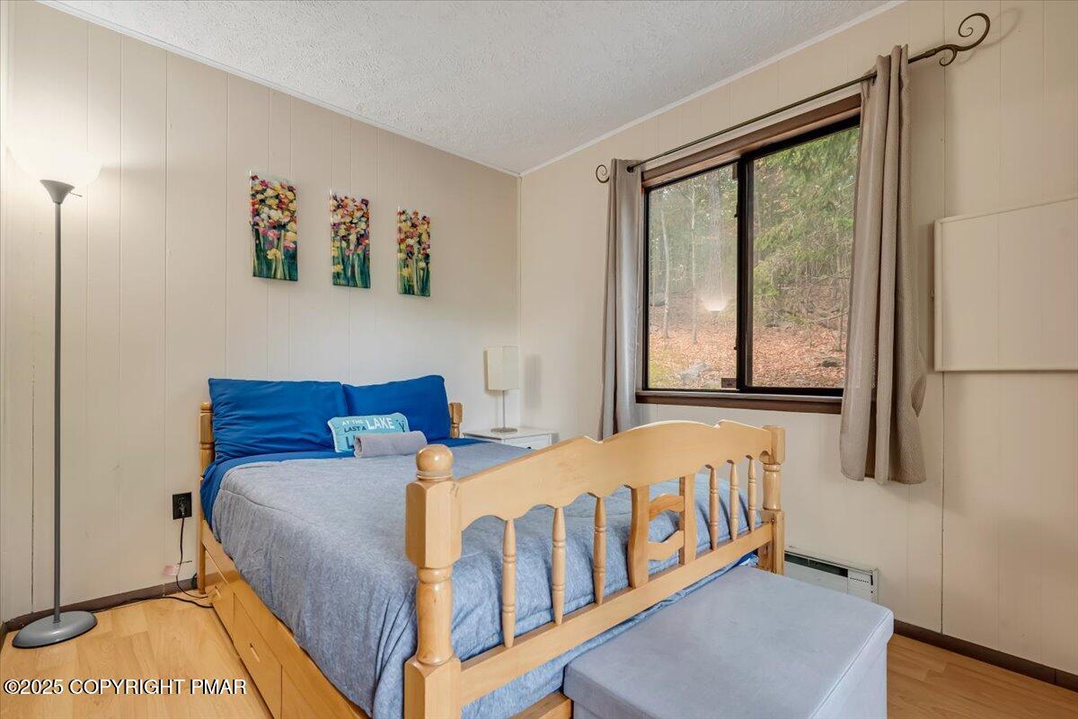 2108 Scarborough Way Bushkill, PA 18324 - Photo 43 of 105 a bedroom with a bed and a window