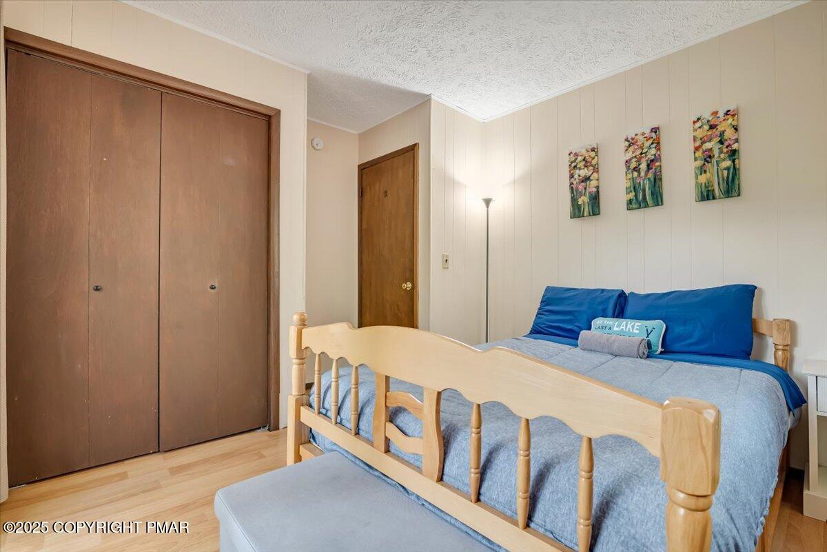 2108 Scarborough Way Bushkill, PA 18324 - Photo 44 of 105 a bedroom with a bed and a window