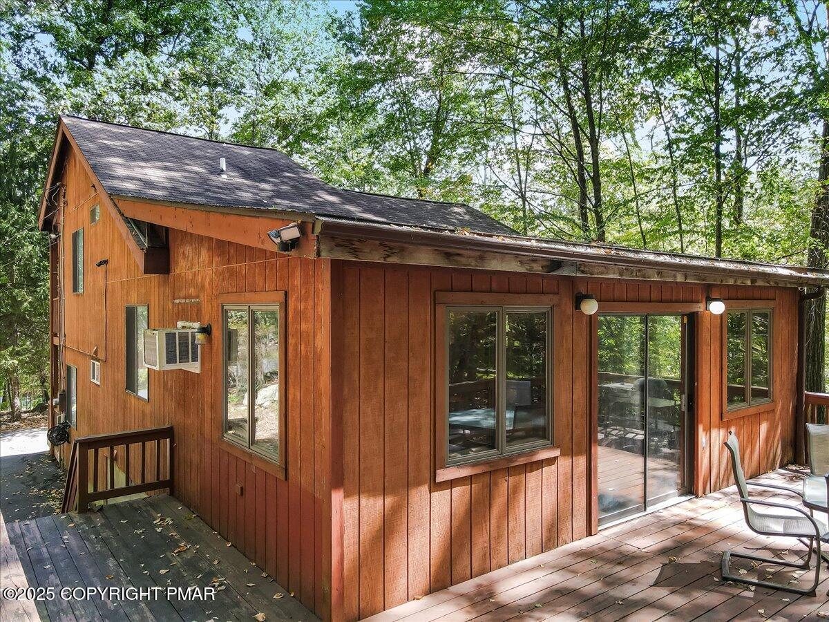 2108 Scarborough Way Bushkill, PA 18324 - Photo 62 of 105 a view of a house with backyard and porch