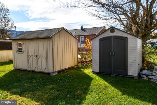 a backyard of a house with lots of green space