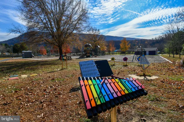 a view of swimming pool with a patio