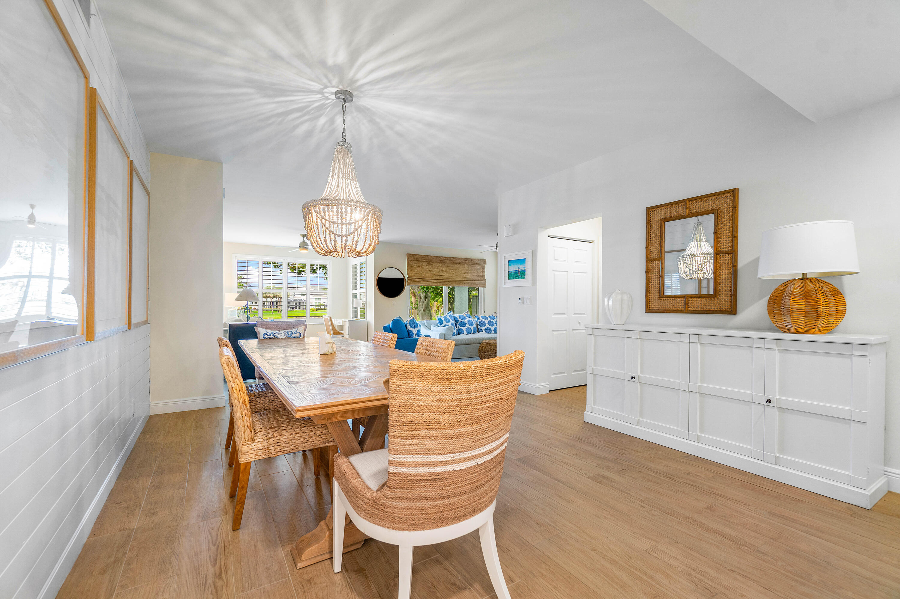 807 Mainsail Circle Jupiter, FL 33477 - Photo 6 of 35 a view of a dining room with furniture window and wooden floor