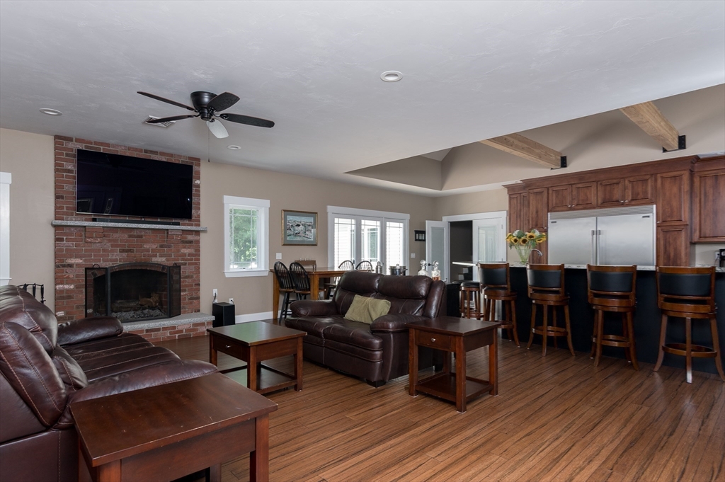 77 Barrel Road Westminster, MA 01473 - Photo 11 of 42 a living room with furniture fireplace and flat screen tv