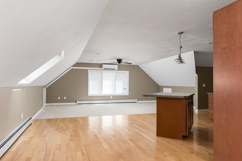 77 Barrel Road Westminster, MA 01473 - Photo 27 of 42 a view of a room with wooden floor and staircase