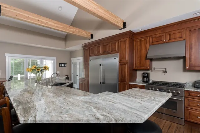 a bed room with a bed and a dresser