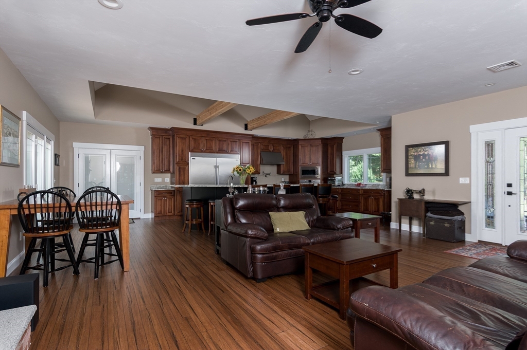 77 Barrel Road Westminster, MA 01473 - Photo 10 of 42 a living room with furniture a wooden floor and a window