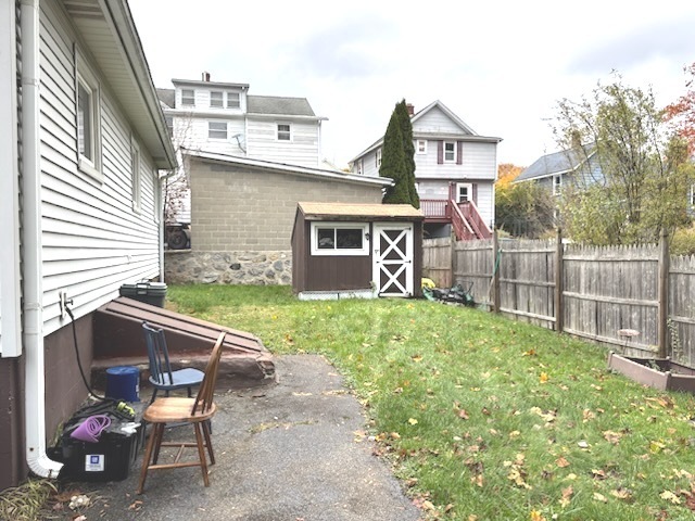 118 Bannon Street Torrington, CT 06790 - Photo 10 of 27 a view of a chairs and table in the back yard of the house