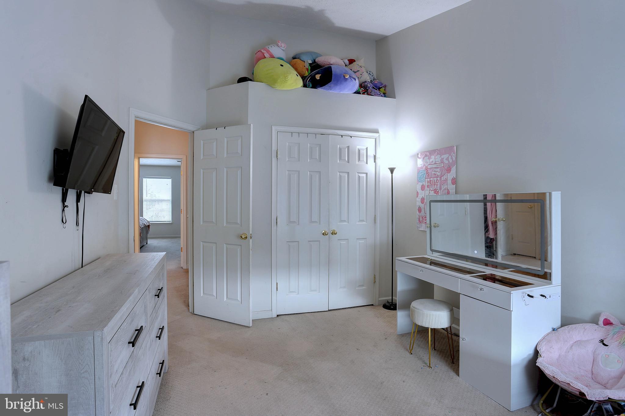 819 Lowe Road Middle River, MD 21220 - Photo 19 of 26 a kitchen with a refrigerator and a flat screen tv