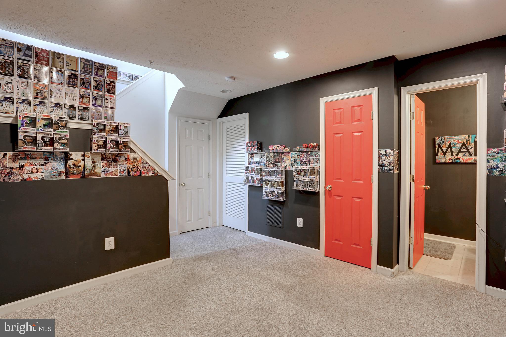 819 Lowe Road Middle River, MD 21220 - Photo 23 of 26 a view of a livingroom with closet and cabinet