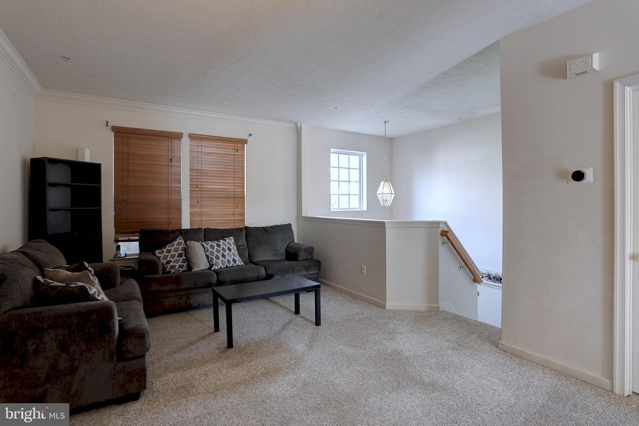819 Lowe Road Middle River, MD 21220 - Photo 4 of 26 a living room with furniture and a window