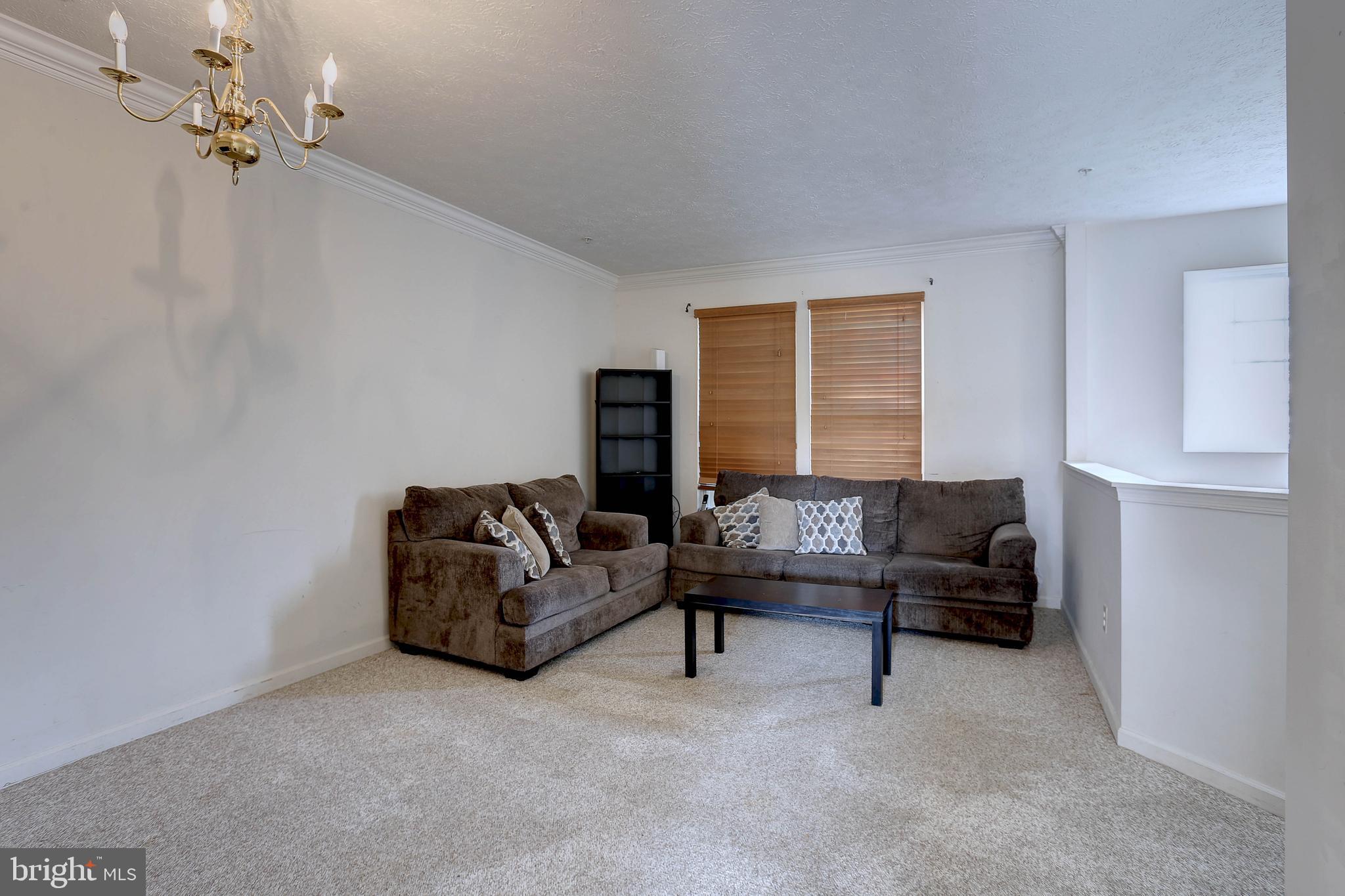 819 Lowe Road Middle River, MD 21220 - Photo 6 of 26 a living room with furniture and a window