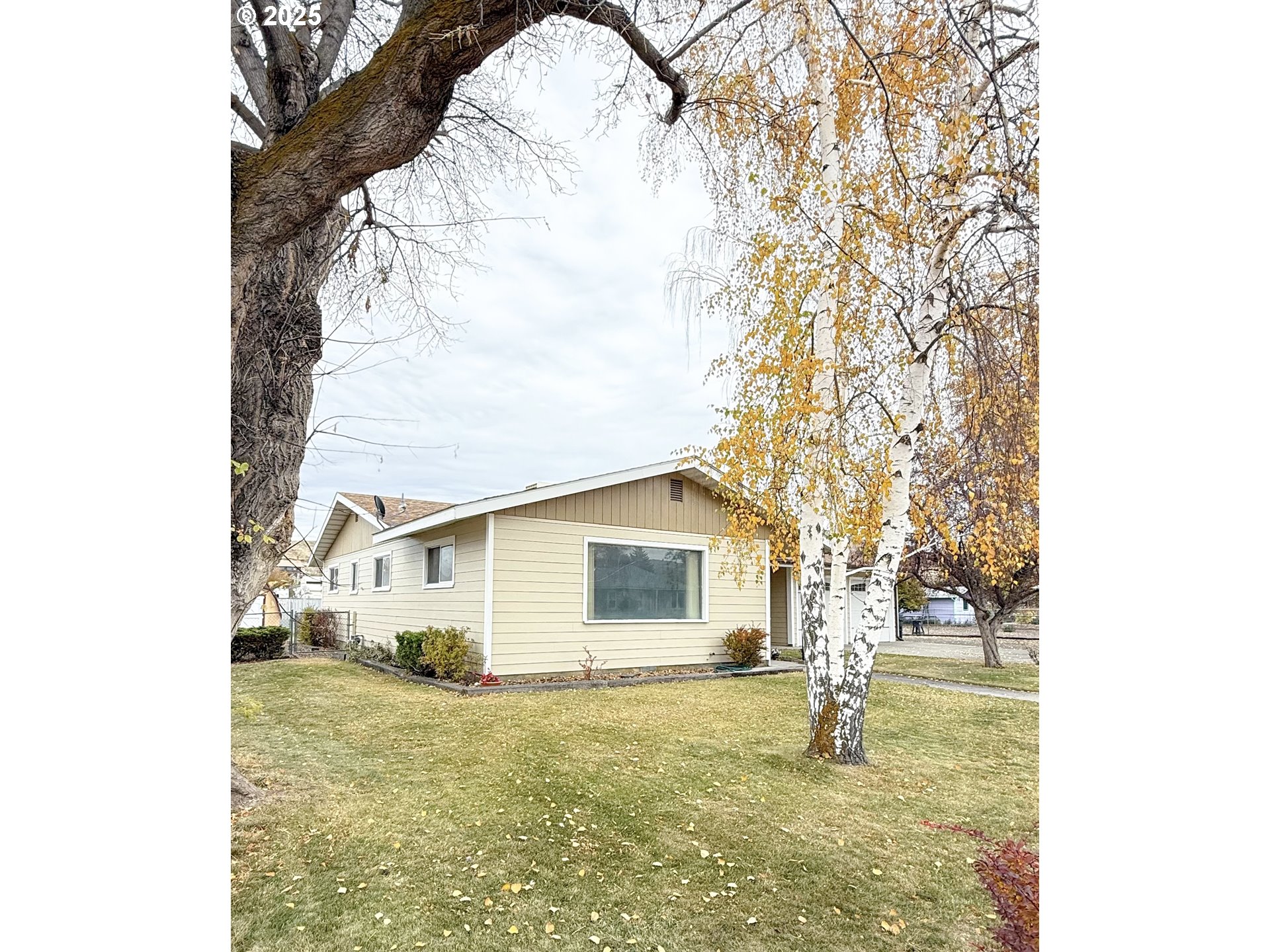 2050 Birch Street Baker City, OR 97814 - Photo 21 of 31 a view of a house with a yard and garage