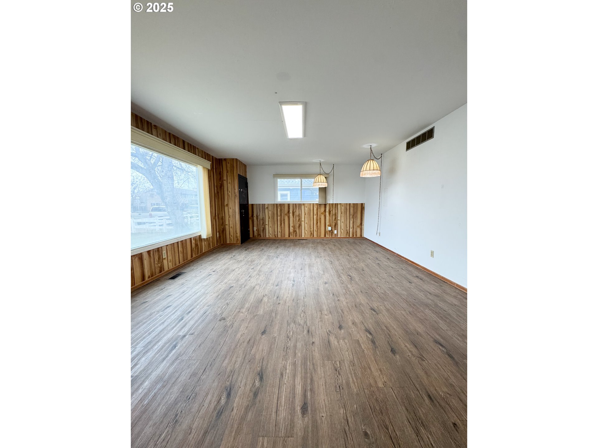 2050 Birch Street Baker City, OR 97814 - Photo 4 of 31 a view of empty room with wooden floor