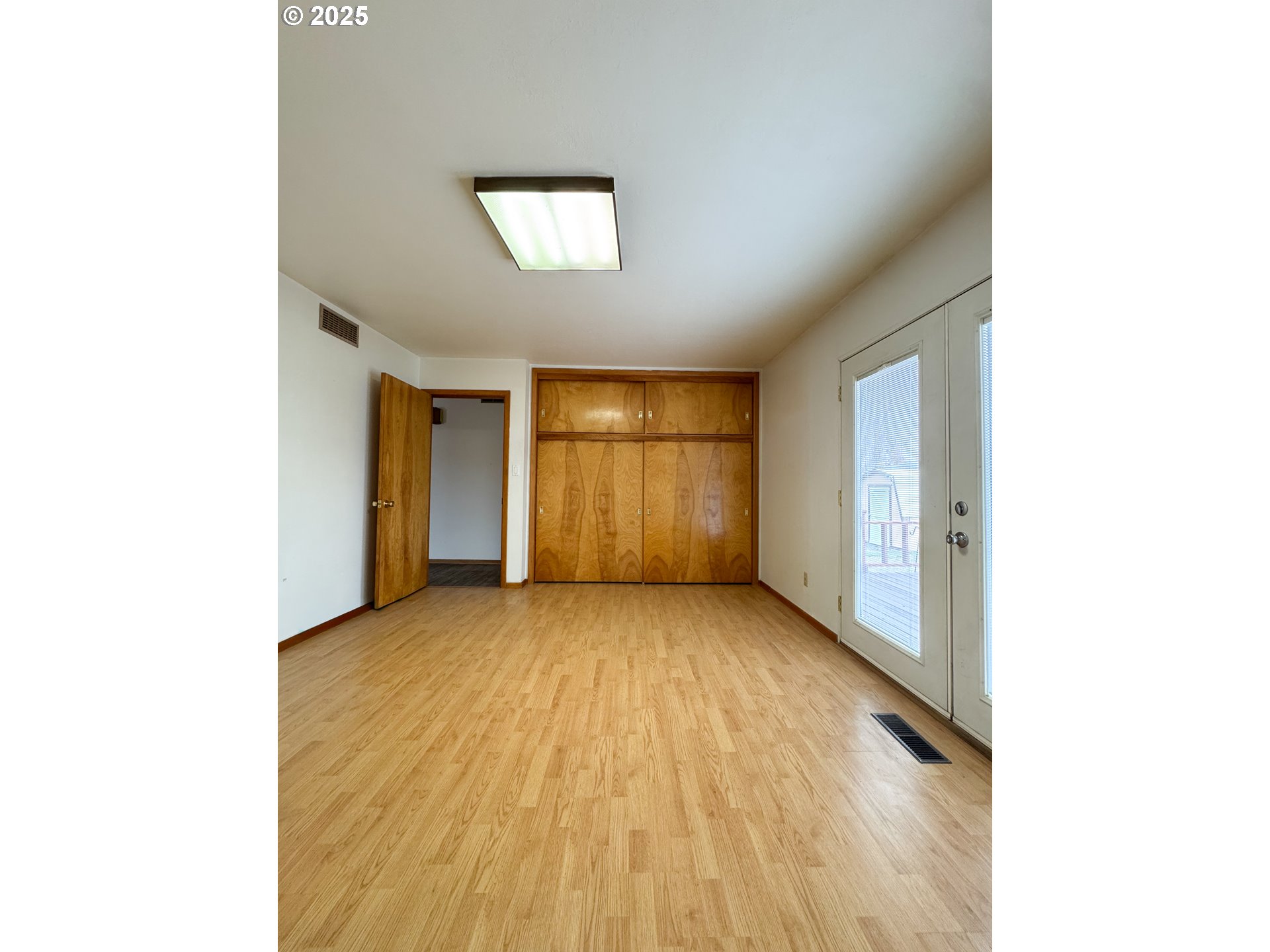 2050 Birch Street Baker City, OR 97814 - Photo 9 of 31 a view of an empty room with a window