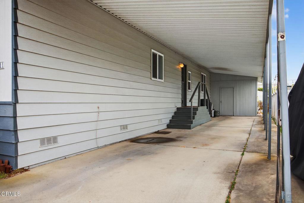 5540 West 5th Street, Unit 111 Oxnard, CA 93035 - Photo 31 of 35 a view of a garage