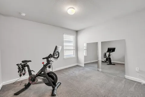 a view of a room with gym equipment