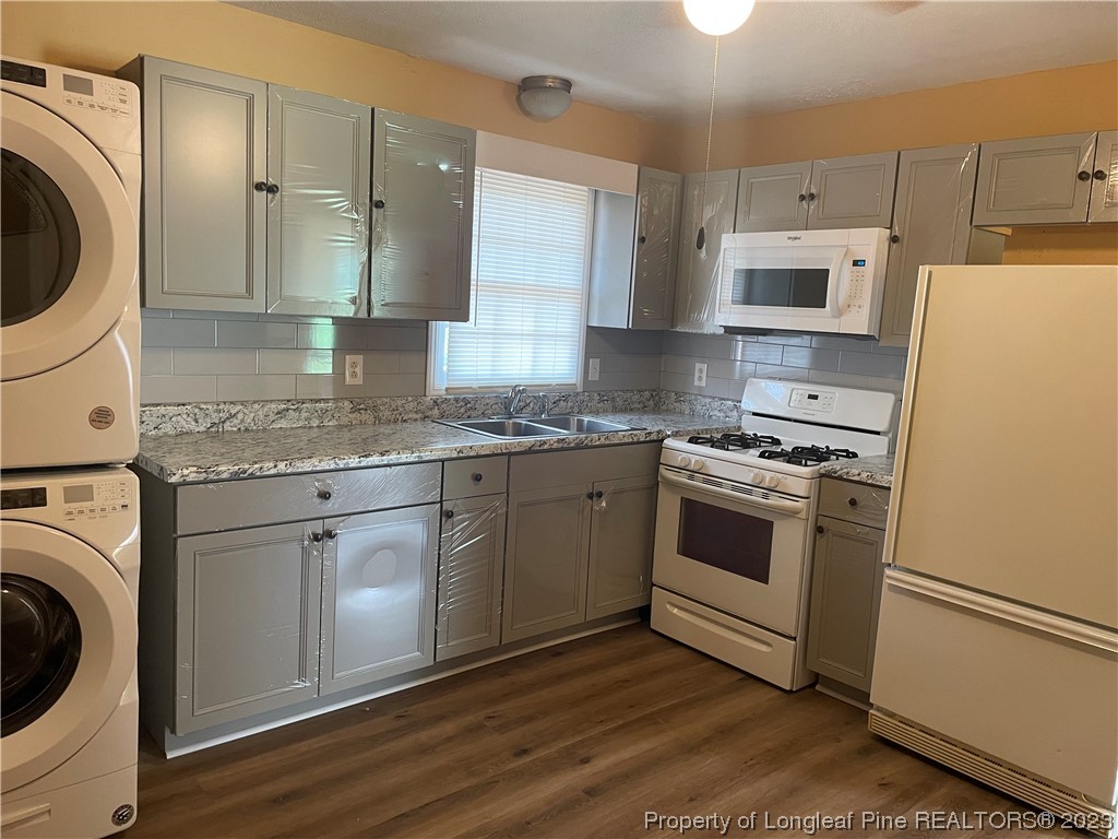 2676 Eldorado Road Fayetteville, NC 28306 - Photo 8 of 19 a kitchen with cabinets stainless steel appliances and sink