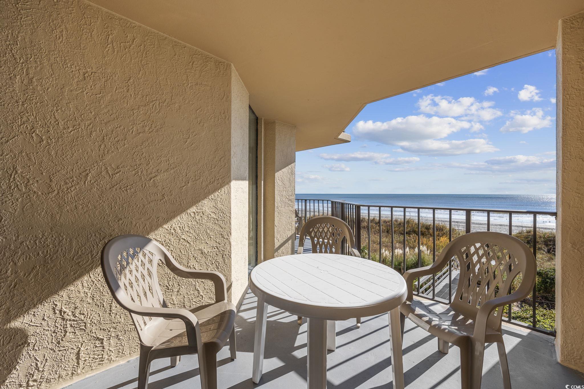 4701 South Ocean Boulevard, Unit 2B North Myrtle Beach, SC 29582 - Photo 25 of 31 Balcony featuring view of water and beach