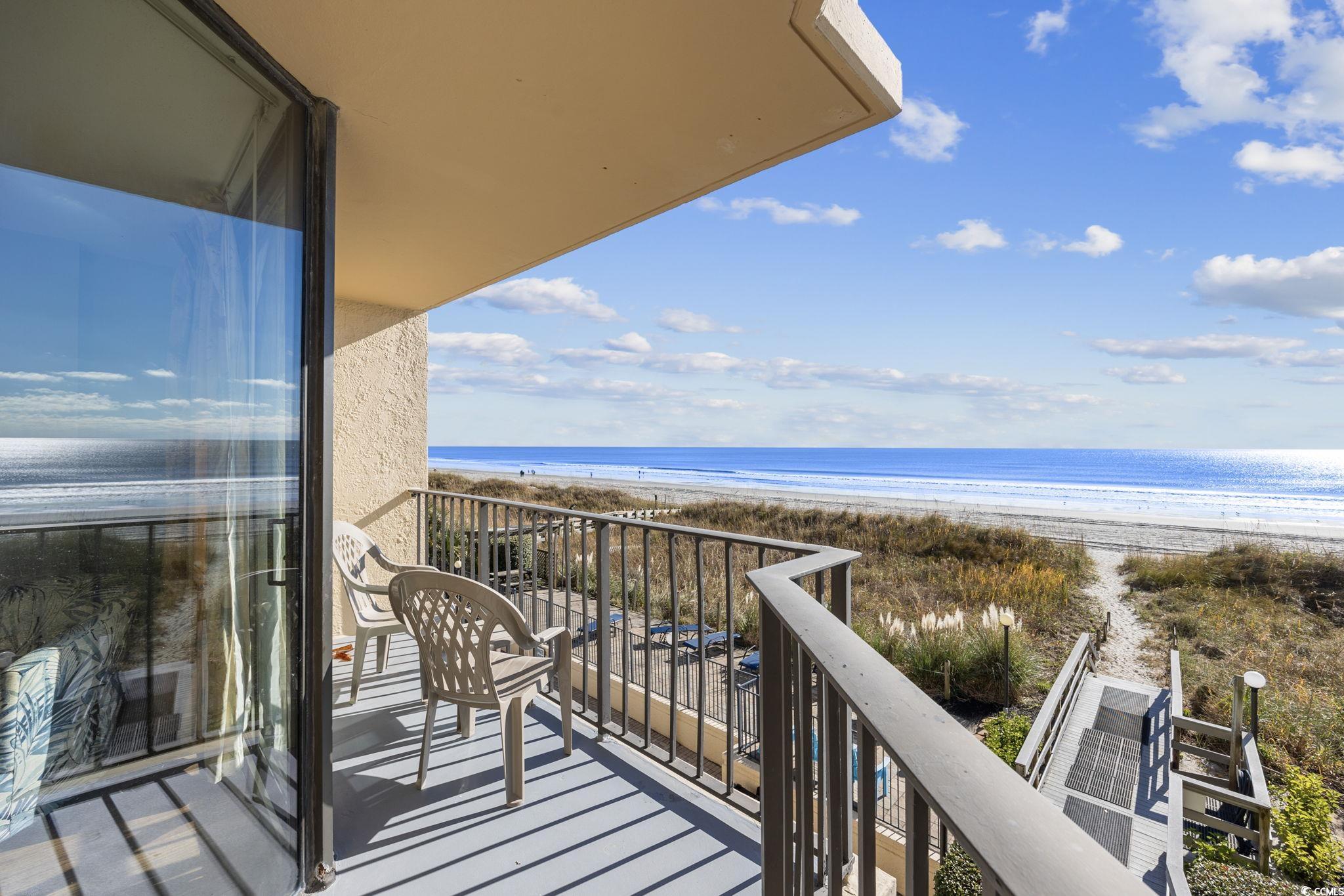 4701 South Ocean Boulevard, Unit 2B North Myrtle Beach, SC 29582 - Photo 27 of 31 Balcony featuring view of water and beach