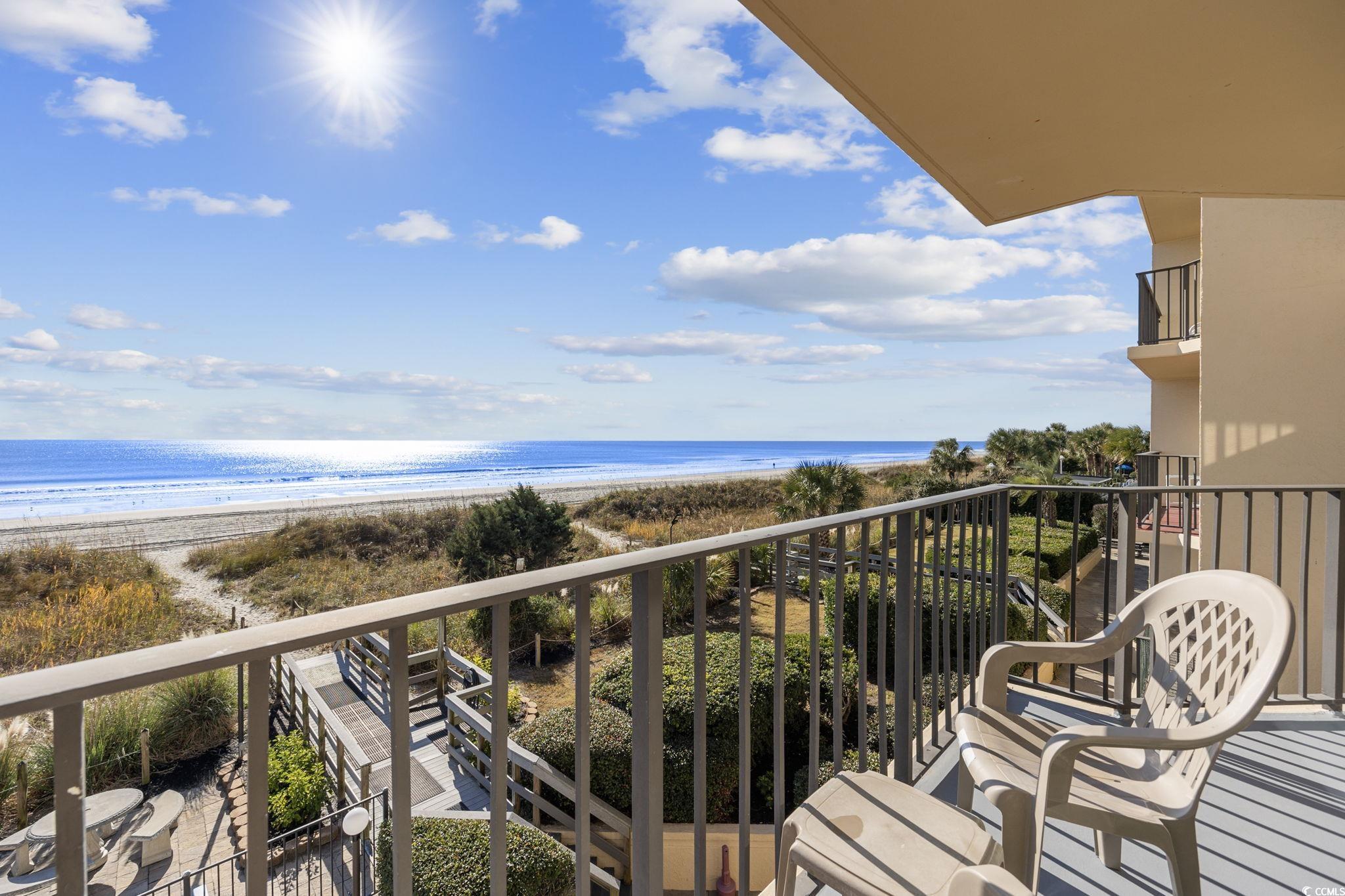 4701 South Ocean Boulevard, Unit 2B North Myrtle Beach, SC 29582 - Photo 28 of 31 Balcony featuring view of water and beach