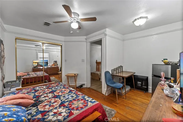 a bedroom with a bed and furniture