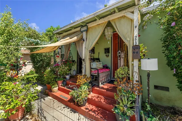 a backyard of a house with lots of green space