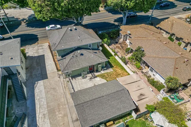 an aerial view of a house with outdoor space