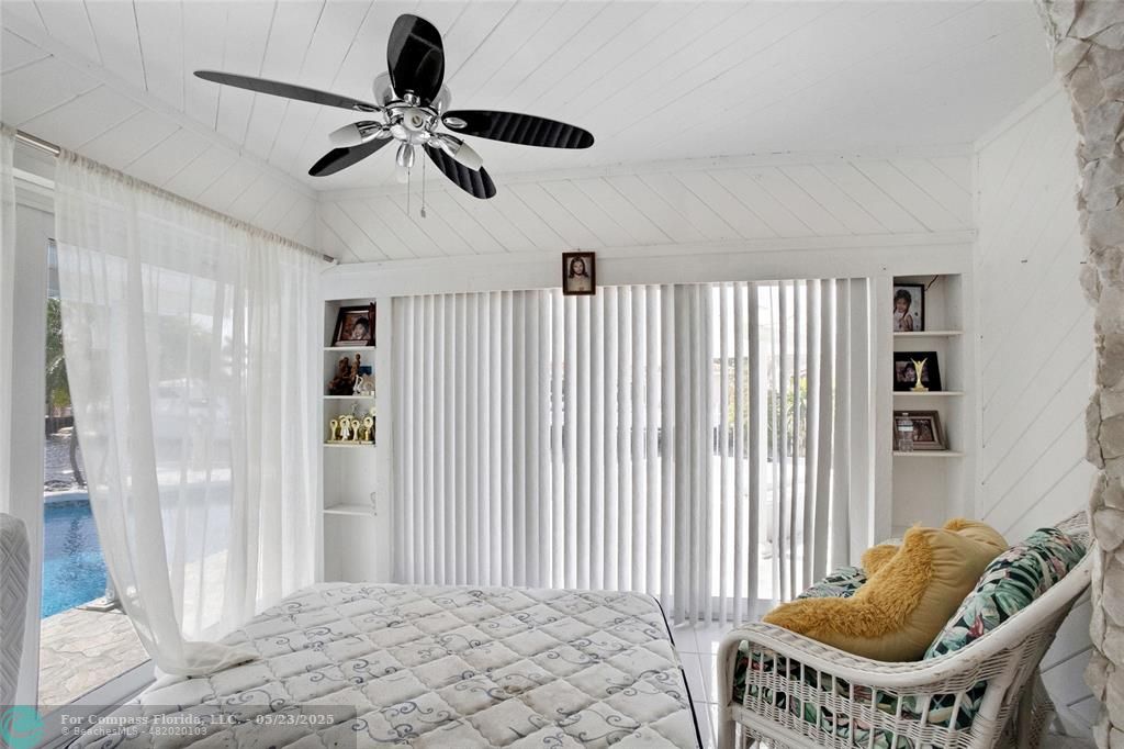 1311 Northeast 27th Way Pompano Beach, FL 33062 - Photo 28 of 58 a living room with furniture and a window