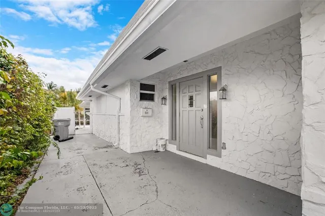 a kitchen with kitchen island cabinets and chairs