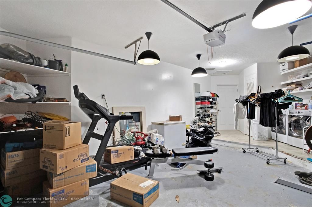 1311 Northeast 27th Way Pompano Beach, FL 33062 - Photo 39 of 58 a view of a room with gym equipment