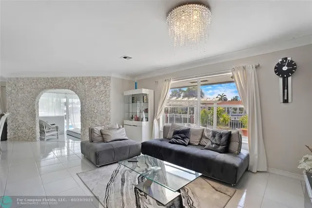 a view of a storage and utility room with washer and dryer