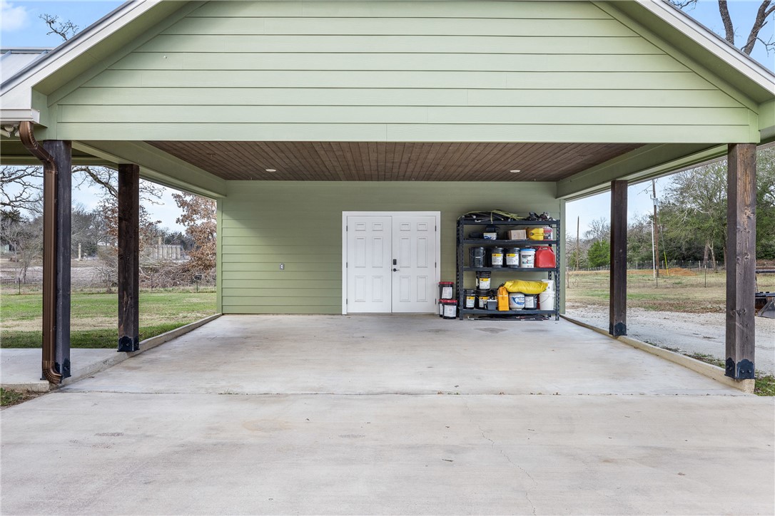 7440 Fm 39 Road South North Zulch, TX 77872 - Photo 8 of 50 a view of a house with a garage