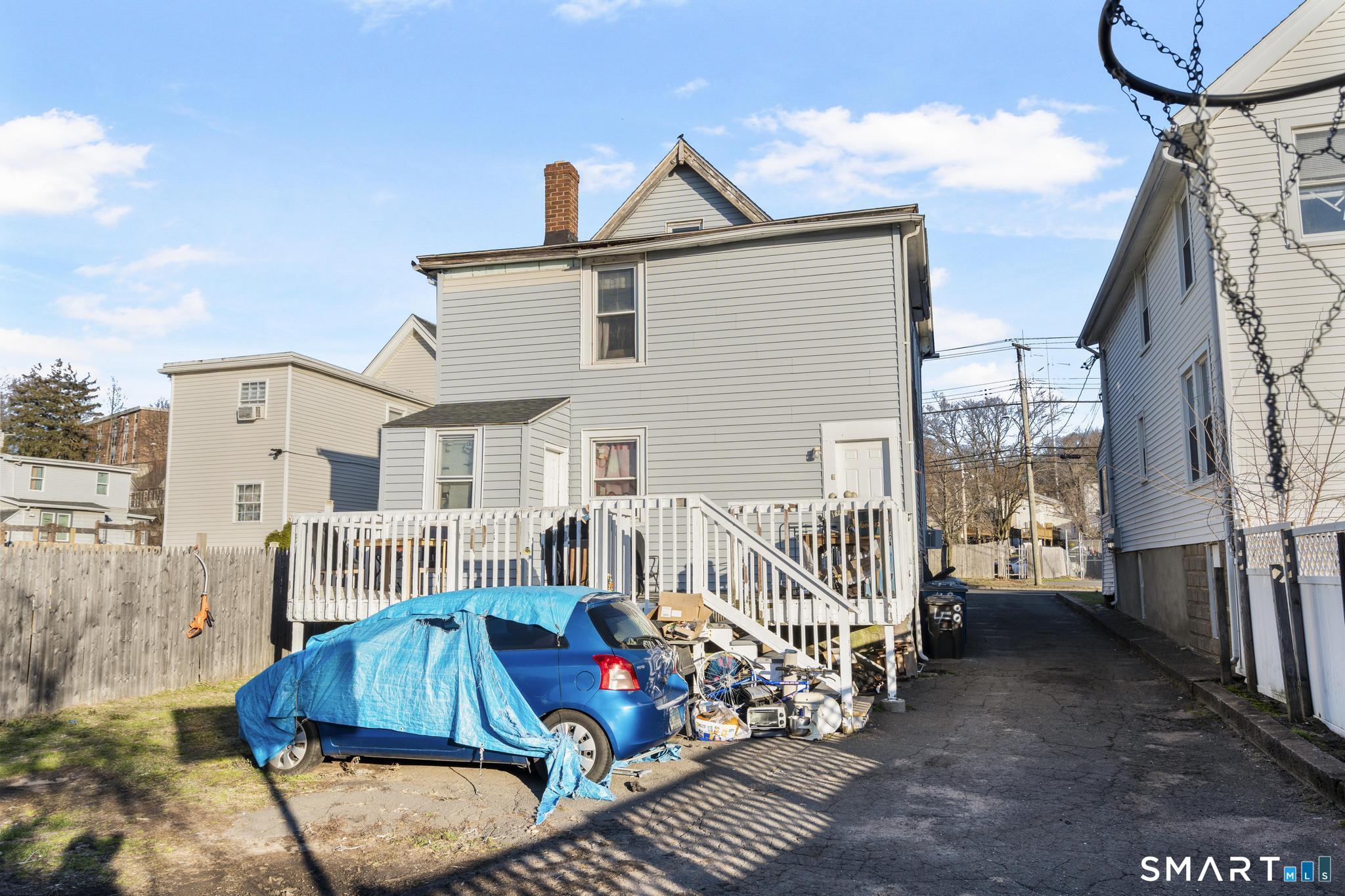 48 Fulton Street New Haven, CT 06513 - Photo 11 of 16 a view of a house with a wooden deck
