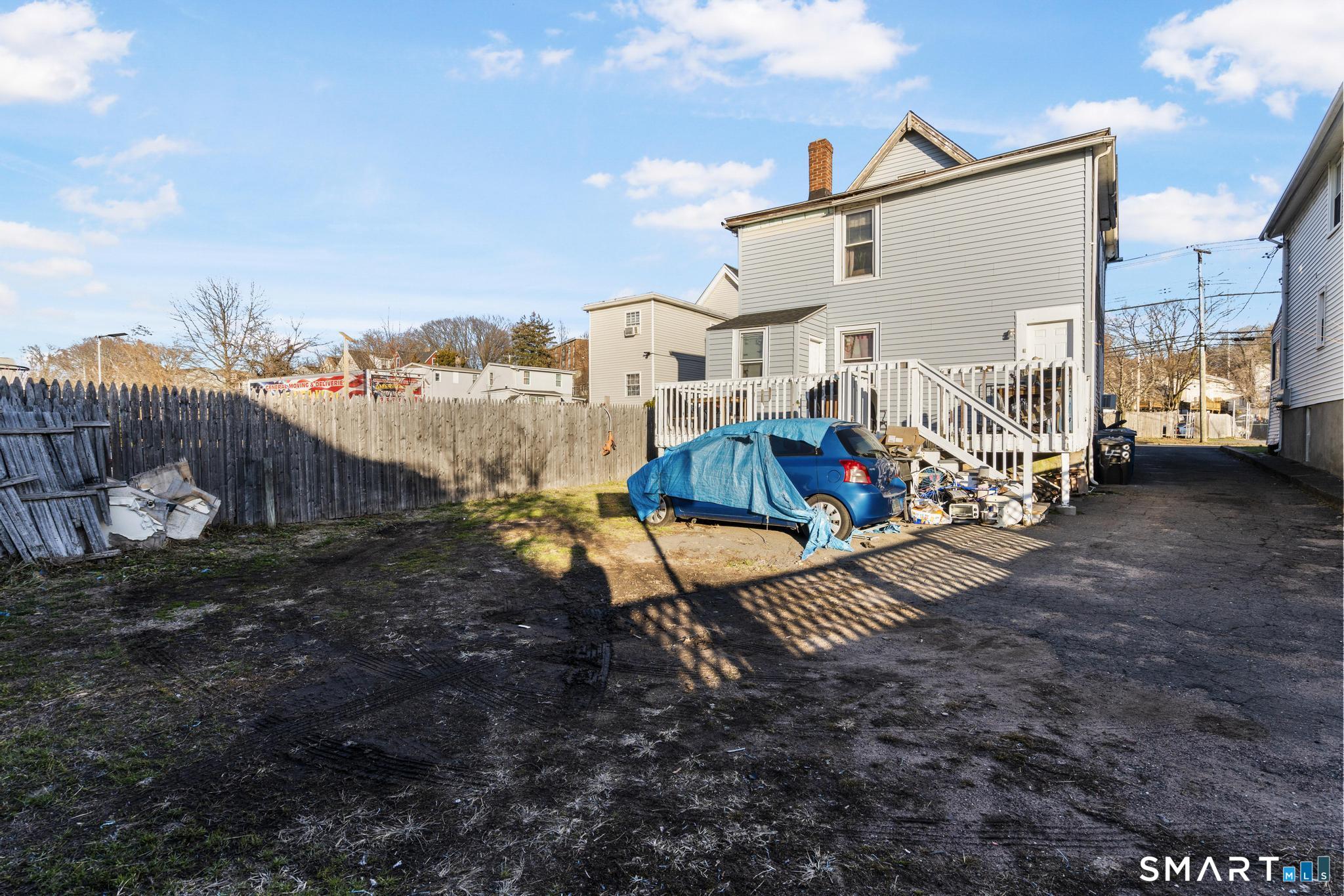 48 Fulton Street New Haven, CT 06513 - Photo 12 of 16 a view of a house with backyard and a tree