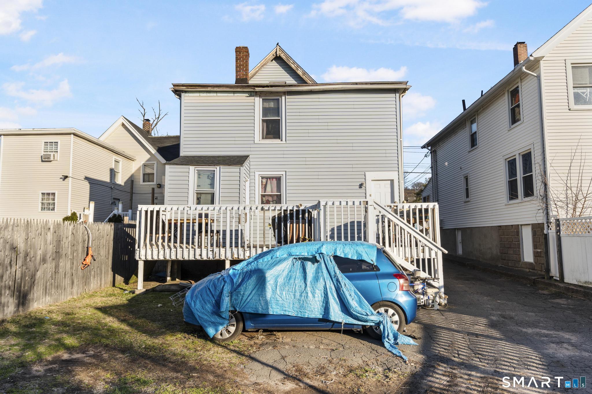 48 Fulton Street New Haven, CT 06513 - Photo 13 of 16 a view of a house with a yard